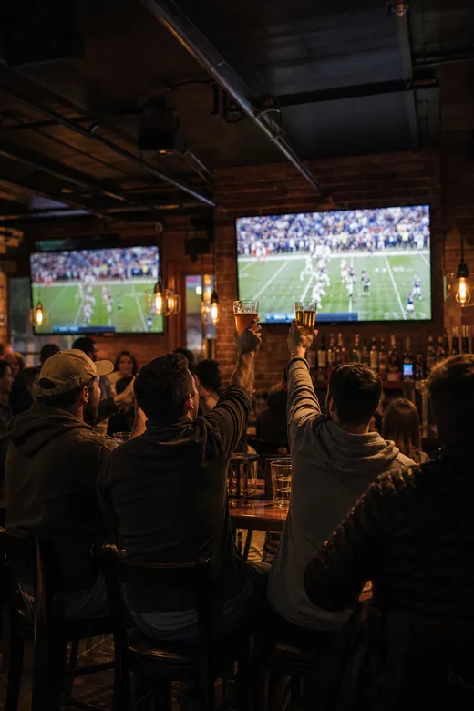 Friends watching a game at a sports bar