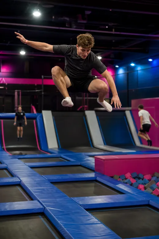 Someone mid-air in a trampoline park
